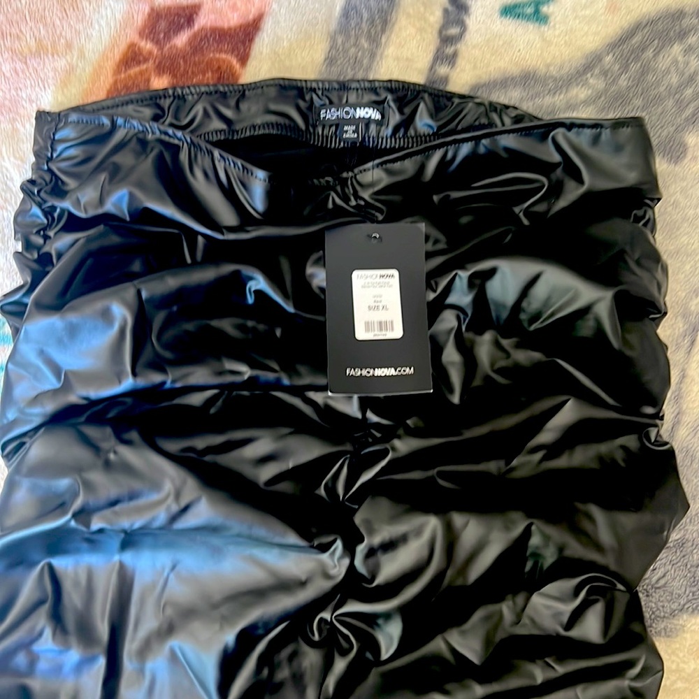 Brand new never worn stacked faux leather pants